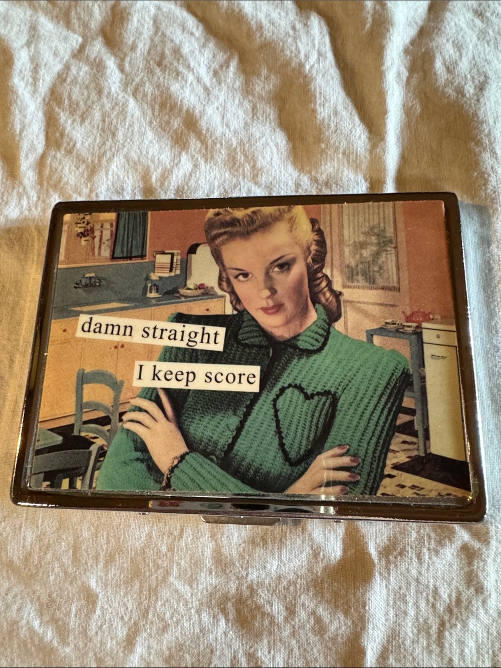 Anne Taintor Cigarette/Id Case (Metal)  titled "Damn Straight I Keep Score”